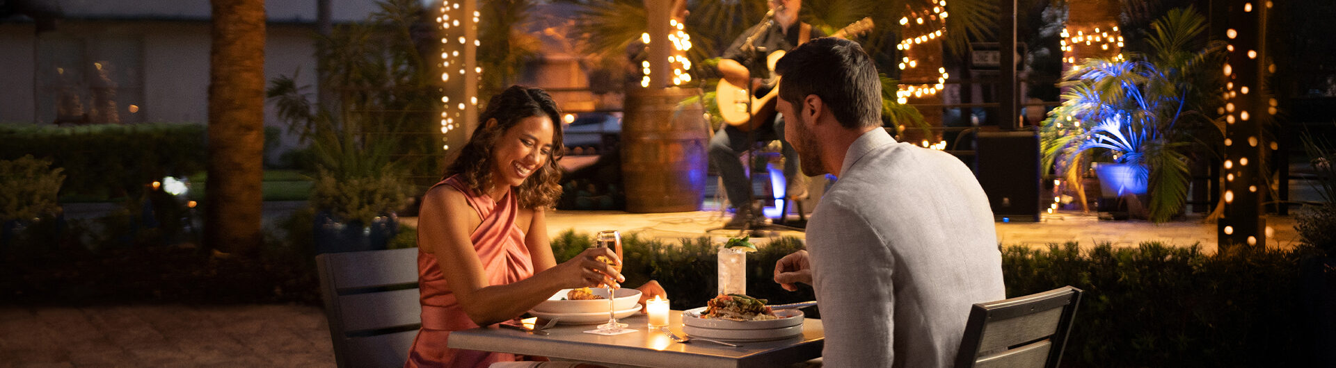 couple dining outdoors at night