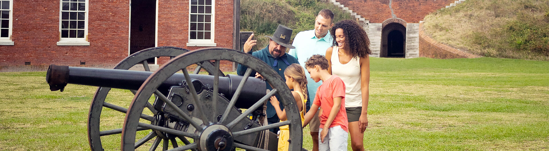 family at Fort Clinch cannon